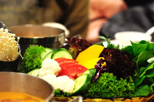 Dishes prepared with vegetable hot pot