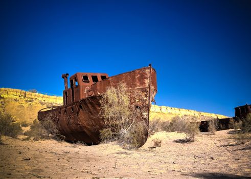 Panorama of ship cemetery near Moynaq at sunrise in Karakalpakstan, Uzbekistan