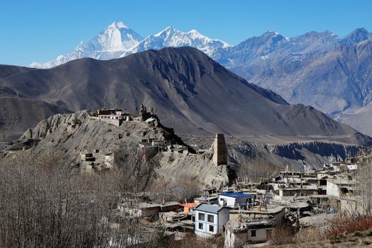 The ruins of an ancient Buddhist monastery next to the current and a small village, near Muktinath