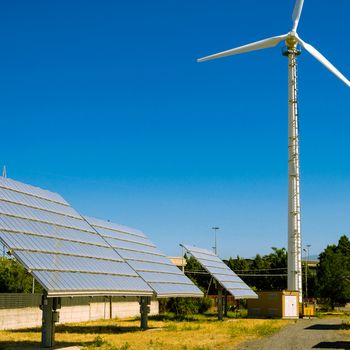 Solar panel and Wind turbine produces green, enviromentaly friendly energy from the sun.