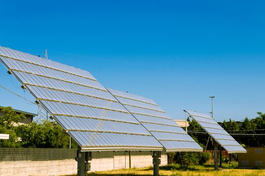 Solar panel and Wind turbine produces green, enviromentaly friendly energy from the sun.