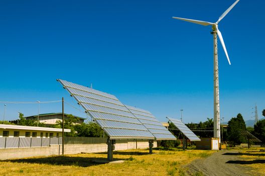 Solar panel and Wind turbine produces green, enviromentaly friendly energy from the sun.