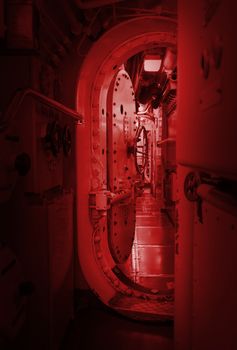 Interior of an old submarine - Limited space and lots of equipment - Door