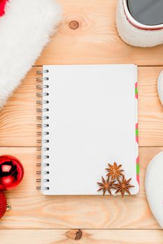 anise on white sheet of notepad in the bottom corner, christmas card