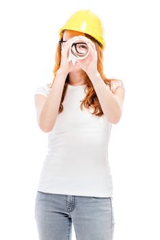 Red-haired girl in yellow helmet with drawings isolated