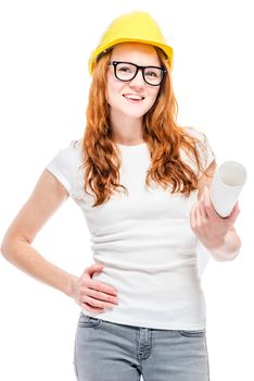 smiling woman in yellow helmet in studio posing