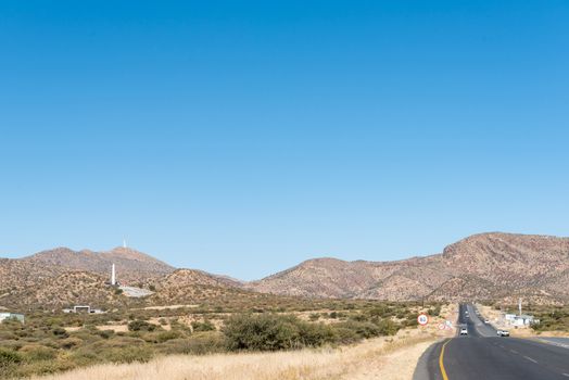Looking South on the B1-road South of Windhoek. The Heroes Acre is visible as well as a microwave telecommunications tower on Grossherzog Friedrich Mountain