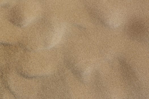 Surface of sand with small troughs