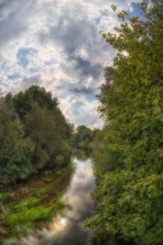 A beautiful landscape scene at a small river