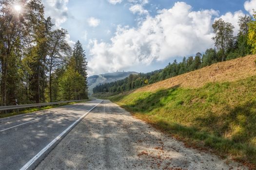 A road leads directly to the great Arber in Bavaria