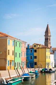 Burano Isle, close to Venice. Traditional colored houses during a sunny day.