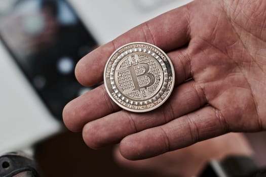 Digital currency physical metal bitcoin coin. Cryptocurrency coins concept.
