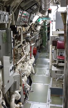 Interior of an old submarine - Limited space and lots of equipment - Door