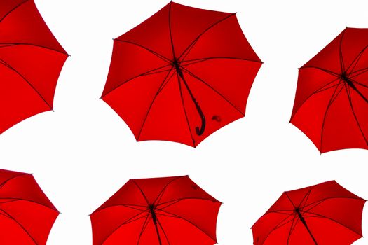 Red umbrellas on isolated on white