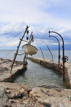 Traditional crane for hoisting small boats out of the sea