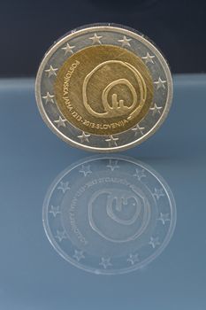 Commemorative 2 EUR coin issued to celebrate the 800th anniversary of world famous cave Postojnska jama, Slovenia