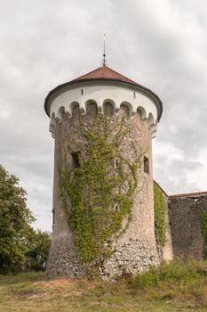 Watchtower and medieval ruins of Kalc (Kalec) castle, Pivka, Slovenia. The castle was built around 1620, today only the tower and ruins of an outbuilding remain.