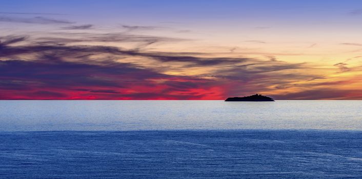 Sunset over Sveti Andrija island near Dubrovnik, Croatia, with it's distinct lighthouse