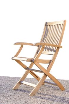 Foldable deck chair on outdoor terrace, made of teak tropical hardwood