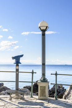 Blue public coin operated tourist telescope - monocular