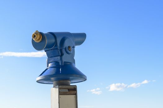 Blue public coin operated tourist telescope - monocular