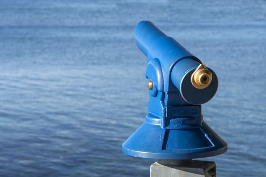 Blue public coin operated tourist telescope - monocular