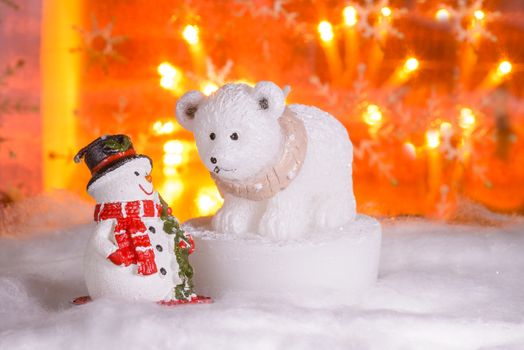 Snowman with polar bear, Happy New Year 2017, Christmas, bright defocused lights in background