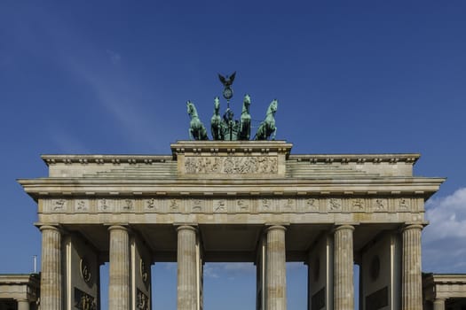 Brandenburg Gate - Brandenburger Tor in Berlin, Germany is one of the most known sites in Berlin and popular tourist attraction