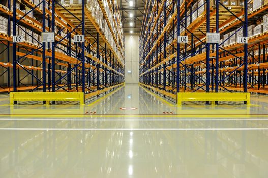 View through the racks of a large warehouse