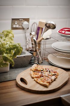 Fresh and tasty vegetarian spicy pizza in the kitchen. Fast food concept.