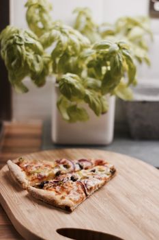 Fresh and tasty vegetarian spicy pizza in the kitchen. Fast food concept.