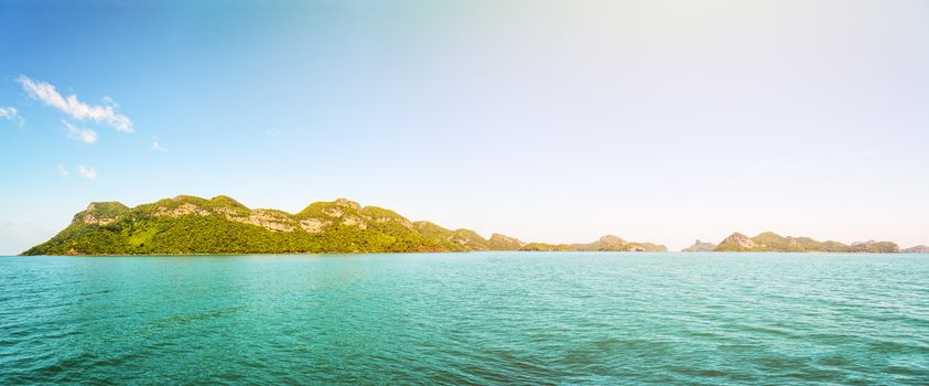 Panorama beautiful natural landscape front of the Mu Ko Ang Thong island, National Marine Park on the sea under bright blue sky and sunlight in summer is a famous attractions in Surat Thani, Thailand