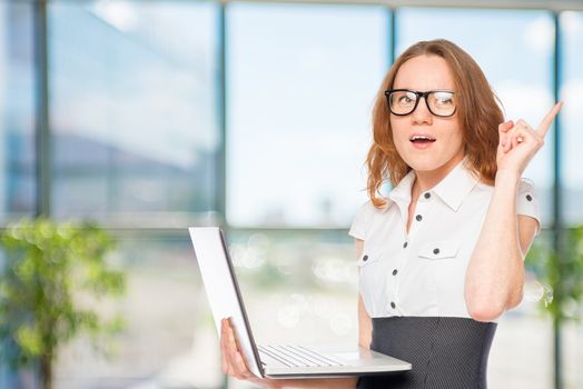 Beautiful receptionist with a great idea in the office