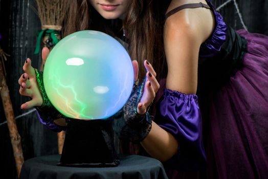 ball of fate in the hands of a successful fortune teller closeup