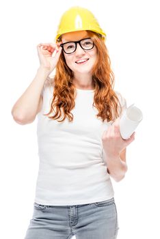 Portrait of a young slender woman who works at a construction site, portrait is isolated