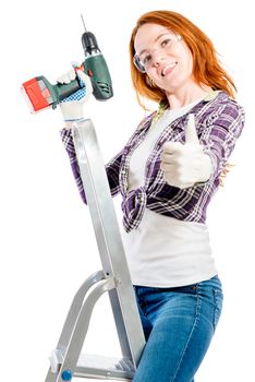 happy young woman with a tool on a white background