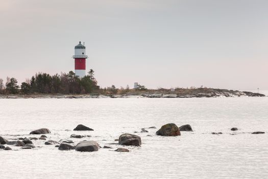 Light House in Holmsund, Sweden with a cloudy sky.
