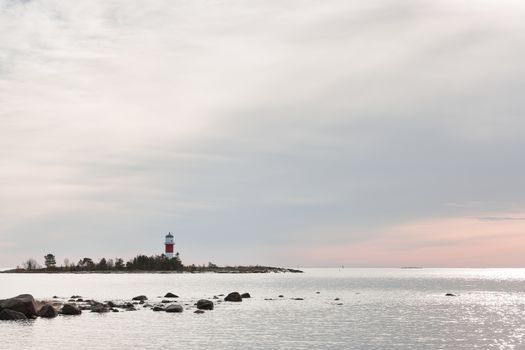 Light House in Holmsund, Sweden with a cloudy sky.