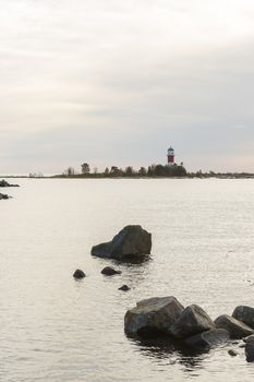 Light House in Holmsund, Sweden with a cloudy sky.