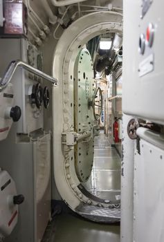 Interior of an old submarine - Limited space and lots of equipment - Door