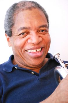 African american jazz musician with his flugelhorn.