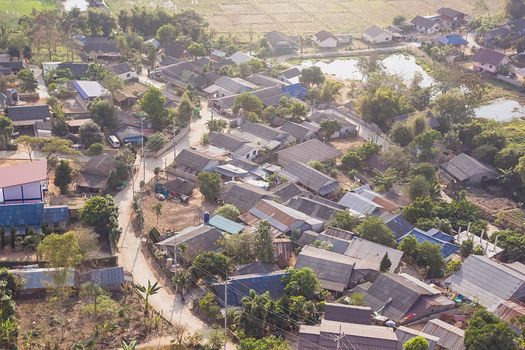 Top view of local city in autumn time, at north of thailand. Color toning effect has been applied.