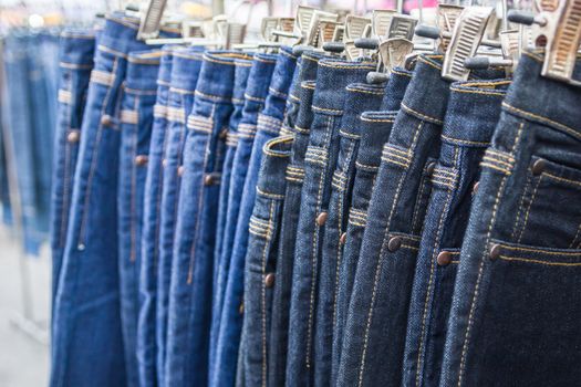 Lot of different blue jeans