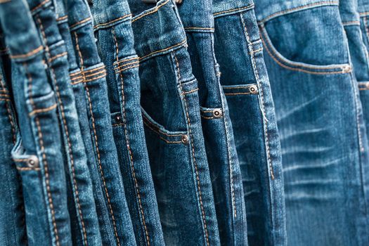 Lot of different blue jeans