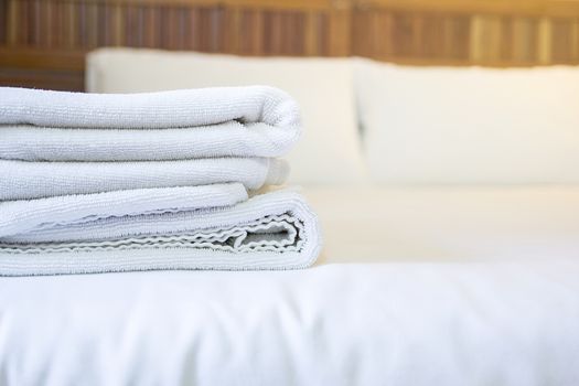 white towel on white mattress fabric, soft light in the morning