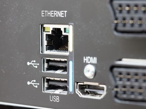 Closeup of a dirty digital multimedia box - Hdmi, scart, usb and ethernet connection