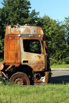 accident burned cab of a truck on the roadside