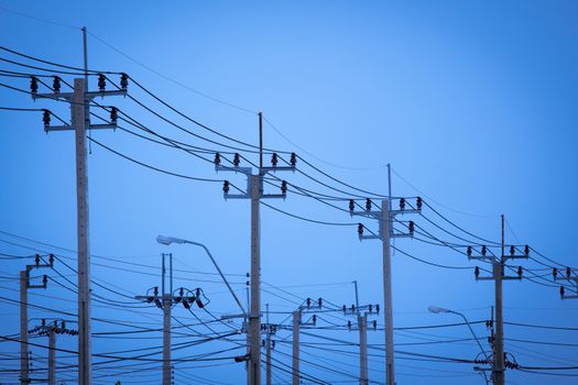 row of electric transmission pylon