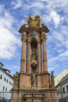 Monumental plague column of Svata Trojica square in historical city Banska Stiavnica, Slovakia