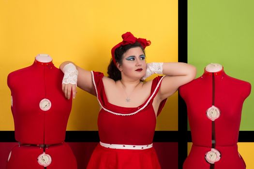 View of pinup vintage girl next to a colorful pop art backdrop.